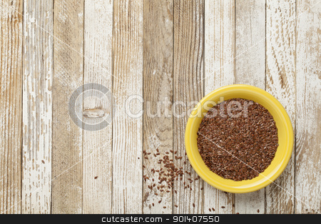 To use this stock image in your creative project, please select the size you need over to the right and click the "Add to Cart" button.
Your downloaded image will come with the Cutcaster watermark removed so don’t worry about the watermark you see on this page. brown flax seeds stock photo, seeds of brown flux in a yellow ceramic bowl on a grunge white painted table by Marek Uliasz