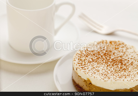 To use this stock image in your creative project, please select the size you need over to the right and click the "Add to Cart" button.
Your downloaded image will come with the Cutcaster watermark removed so don’t worry about the watermark you see on this page. mocha cheesecake stock photo, a round mocha cheesecake on platte with a cup espresso coffee by Marek Uliasz