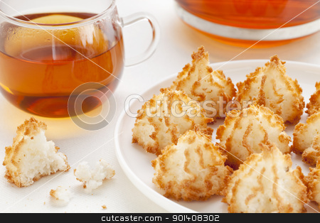To use this stock image in your creative project, please select the size you need over to the right and click the "Add to Cart" button.
Your downloaded image will come with the Cutcaster watermark removed so don’t worry about the watermark you see on this page. tea and coconut macaroons stock photo, plate of coconut macaroon cookies and cup of tea by Marek Uliasz