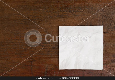 To use this stock image in your creative project, please select the size you need over to the right and click the "Add to Cart" button.
Your downloaded image will come with the Cutcaster watermark removed so don’t worry about the watermark you see on this page. white napkin and old table stock photo, white cocktail napkin on old scratched wood table by Marek Uliasz