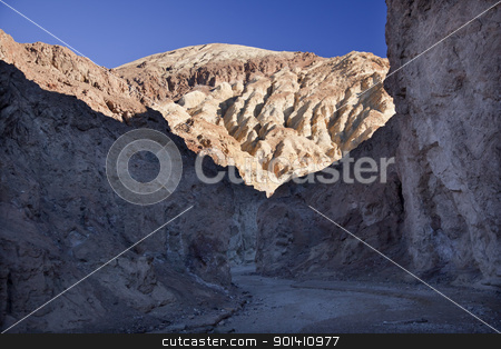 To use this stock image in your creative project, please select the size you need over to the right and click the "Add to Cart" button.
Your downloaded image will come with the Cutcaster watermark removed so don’t worry about the watermark you see on this page. Golden Canyon Entrance Road Death Valley National Park Californi stock photo, Golden Canyon Entrance Road Death Valley National Park California by William Perry