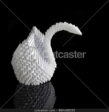 To use this stock image in your creative project, please select the size you need over to the right and click the "Add to Cart" button.
Your downloaded image will come with the Cutcaster watermark removed so don’t worry about the watermark you see on this page. Origami swan stock photo, White paper origami swan on black background by sutike