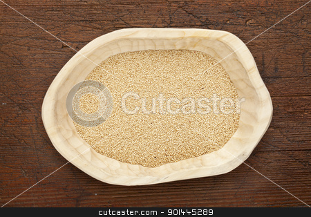 To use this stock image in your creative project, please select the size you need over to the right and click the "Add to Cart" button.
Your downloaded image will come with the Cutcaster watermark removed so don’t worry about the watermark you see on this page. amaranth grain stock photo, amaranth igrain n a rustic wood bowl against grunge dark wooden table surface, top view by Marek Uliasz