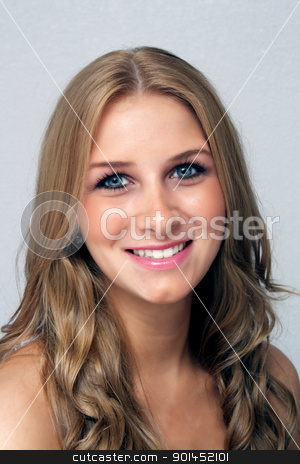 To use this stock image in your creative project, please select the size you need over to the right and click the "Add to Cart" button.
Your downloaded image will come with the Cutcaster watermark removed so don’t worry about the watermark you see on this page. Beautiful Young Blonde, Headshot (2) stock photo, A studio close-up of a lovely young blonde with a warm, friendly smile. by Carl Stewart
