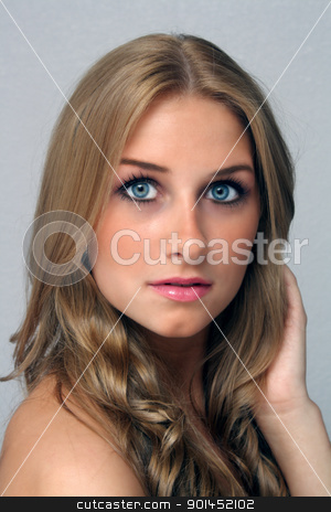 To use this stock image in your creative project, please select the size you need over to the right and click the "Add to Cart" button.
Your downloaded image will come with the Cutcaster watermark removed so don’t worry about the watermark you see on this page. Beautiful Young Blonde, Headshot (3) stock photo, A studio close-up of a lovely young blonde with captivating eyes. by Carl Stewart