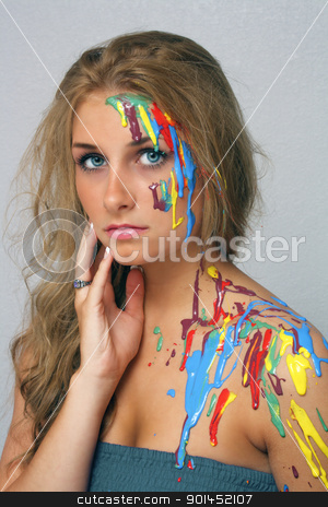 To use this stock image in your creative project, please select the size you need over to the right and click the "Add to Cart" button.
Your downloaded image will come with the Cutcaster watermark removed so don’t worry about the watermark you see on this page. Beautiful Young Blonde, Headshot (5) stock photo, A studio close-up of a lovely young blonde with several colors of paint poured and dripping on her. by Carl Stewart