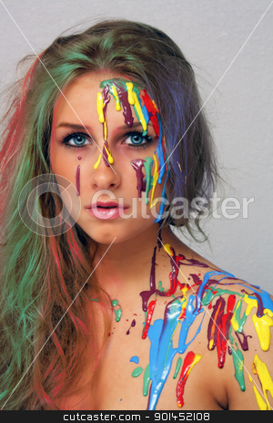 To use this stock image in your creative project, please select the size you need over to the right and click the "Add to Cart" button.
Your downloaded image will come with the Cutcaster watermark removed so don’t worry about the watermark you see on this page. Beautiful Young Blonde, Headshot (6) stock photo, A studio close-up of a lovely young blonde with multicolored hair and several colors of paint poured and dripping on her. by Carl Stewart