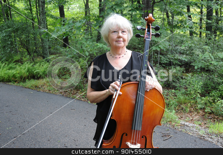 To use this stock image in your creative project, please select the size you need over to the right and click the "Add to Cart" button.
Your downloaded image will come with the Cutcaster watermark removed so don’t worry about the watermark you see on this page. Female cellist. stock photo, Female cellist standing with her instrument outside. by OSCAR Williams