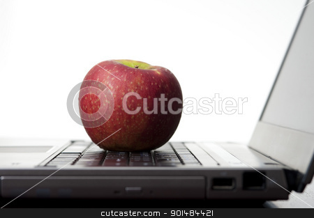 To use this stock image in your creative project, please select the size you need over to the right and click the "Add to Cart" button.
Your downloaded image will come with the Cutcaster watermark removed so don’t worry about the watermark you see on this page. Apple On A Laptop stock photo, Education concept with an apple resting on an open laptop computer, studio on white by Stephen Gibson