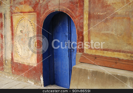 To use this stock image in your creative project, please select the size you need over to the right and click the "Add to Cart" button.
Your downloaded image will come with the Cutcaster watermark removed so don’t worry about the watermark you see on this page. Blue monastery church door stock photo, Indigo blue monastery wooden church door, painted wall by Aleksandar Varbenov
