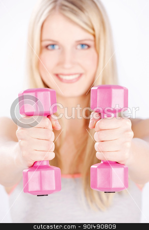 To use this stock image in your creative project, please select the size you need over to the right and click the "Add to Cart" button.
Your downloaded image will come with the Cutcaster watermark removed so don’t worry about the watermark you see on this page. two weights in woman's hands stock photo, Young woman with two weights doing fitness exercises, focus on weights by iMarin