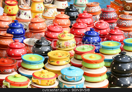 To use this stock image in your creative project, please select the size you need over to the right and click the "Add to Cart" button.
Your downloaded image will come with the Cutcaster watermark removed so don’t worry about the watermark you see on this page. Colorful clay pots stock photo, Colorful hand made parts by Sreedhar Yedlapati