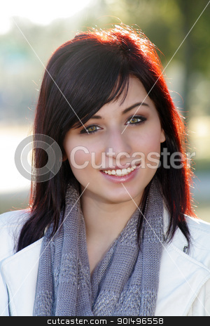 To use this stock image in your creative project, please select the size you need over to the right and click the "Add to Cart" button.
Your downloaded image will come with the Cutcaster watermark removed so don’t worry about the watermark you see on this page. Beautiful Woman Outdoors (5) stock photo, Close-up of a beautiful young woman with auburn hair, outdoors, backlit with brilliant morning sunlight. by Carl Stewart