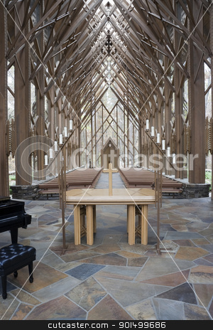 To use this stock image in your creative project, please select the size you need over to the right and click the "Add to Cart" button.
Your downloaded image will come with the Cutcaster watermark removed so don’t worry about the watermark you see on this page. Church Alter stock photo, The insides of a wooden and glass church with alter by Kevin Tietz