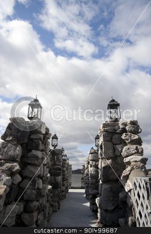 To use this stock image in your creative project, please select the size you need over to the right and click the "Add to Cart" button.
Your downloaded image will come with the Cutcaster watermark removed so don’t worry about the watermark you see on this page. Pier stock photo, A pier made out of stone and with black lights on the edge. by Kevin Tietz