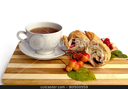 To use this stock image in your creative project, please select the size you need over to the right and click the "Add to Cart" button.
Your downloaded image will come with the Cutcaster watermark removed so don’t worry about the watermark you see on this page. White cup and a croissant on the board stock photo, Tea in a white cup, broke a croissant with jam, a sprig of wild apples, viburnum with leaves on a wooden board isolated on white background by rezkrr