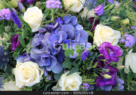 To use this stock image in your creative project, please select the size you need over to the right and click the "Add to Cart" button.
Your downloaded image will come with the Cutcaster watermark removed so don’t worry about the watermark you see on this page. Flower arrangement with blue hydrangea, white roses and ivy stock photo, Flower arrangement in blue and white with hydrangea and roses by Porto Sabbia