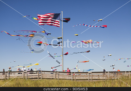 To use this stock image in your creative project, please select the size you need over to the right and click the "Add to Cart" button.
Your downloaded image will come with the Cutcaster watermark removed so don’t worry about the watermark you see on this page. Kites and beach boardwalk stock photo, LONG BEACH, WASHINGTON, USA - AUGUST 20: Visitors stroll the boardwalk during the International Kite Festival August 20, 2011. The annual event draws kite enthusiasts from around the world. by Bryan Mullennix