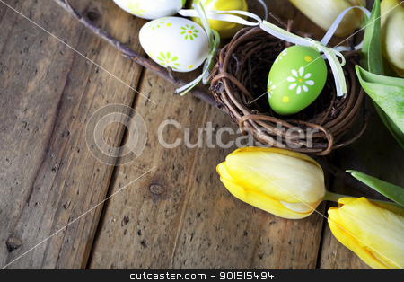 To use this stock image in your creative project, please select the size you need over to the right and click the "Add to Cart" button.
Your downloaded image will come with the Cutcaster watermark removed so don’t worry about the watermark you see on this page. easter eggs with yellow tulip flowers stock photo, easter eggs with yellow tulip flowers isolated on wooden board by klenova