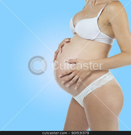 To use this stock image in your creative project, please select the size you need over to the right and click the "Add to Cart" button.
Your downloaded image will come with the Cutcaster watermark removed so don’t worry about the watermark you see on this page. Pregnant woman holding tummy stock photo, Future mother - Pregnant woman holding tummy by Adam Radosavljevic