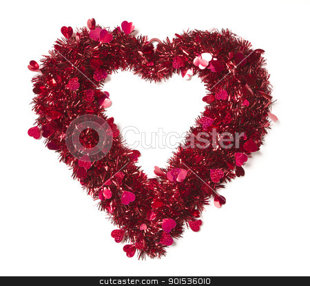 To use this stock image in your creative project, please select the size you need over to the right and click the "Add to Cart" button.
Your downloaded image will come with the Cutcaster watermark removed so don’t worry about the watermark you see on this page. Heart Shaped Shiny Tinsel with Small Hearts stock photo, Heart Shaped Shiny Tinsel with Small Hearts on a White Background. by Andy Dean