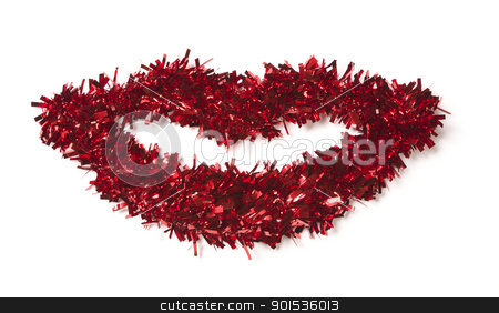 To use this stock image in your creative project, please select the size you need over to the right and click the "Add to Cart" button.
Your downloaded image will come with the Cutcaster watermark removed so don’t worry about the watermark you see on this page. Lip Shaped Red Tinsel on White stock photo, Lip Shaped Red Tinsel on a White Background. by Andy Dean