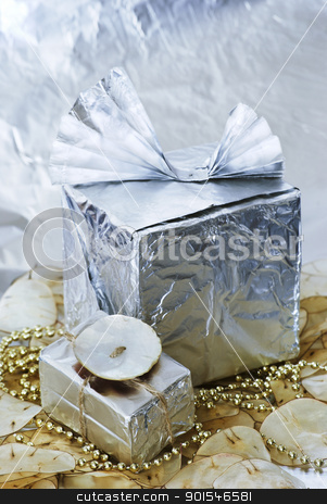 To use this stock image in your creative project, please select the size you need over to the right and click the "Add to Cart" button.
Your downloaded image will come with the Cutcaster watermark removed so don’t worry about the watermark you see on this page. christmas gifts stock photo, christmas gifts by Sarka
