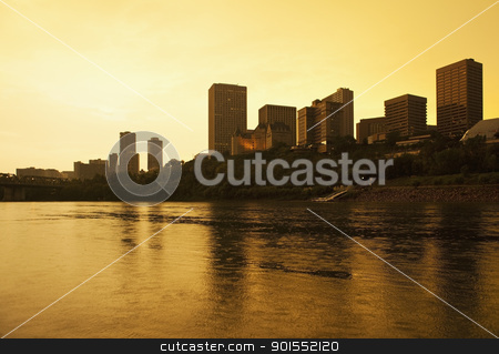 To use this stock image in your creative project, please select the size you need over to the right and click the "Add to Cart" button.
Your downloaded image will come with the Cutcaster watermark removed so don’t worry about the watermark you see on this page. Downtown Edmonton, Canada at Sunset stock photo, Edmonton, Alberta, Canada, skyline silhoutte at dusk by Bryan Mullennix