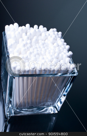 To use this stock image in your creative project, please select the size you need over to the right and click the "Add to Cart" button.
Your downloaded image will come with the Cutcaster watermark removed so don’t worry about the watermark you see on this page. Cotton buds in glass dark background stock photo, Cotton buds in a glass on a glass table on a dark background by Nanisimova