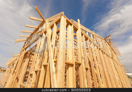 To use this stock image in your creative project, please select the size you need over to the right and click the "Add to Cart" button.
Your downloaded image will come with the Cutcaster watermark removed so don’t worry about the watermark you see on this page. New Construction Home Framing Abstract stock photo, New Construction Wood Home Framing Abstract. by Andy Dean