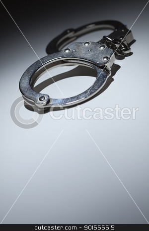 To use this stock image in your creative project, please select the size you need over to the right and click the "Add to Cart" button.
Your downloaded image will come with the Cutcaster watermark removed so don’t worry about the watermark you see on this page. Abstract Pair of Handcuffs Under Spot Light - Text Room stock photo, Abstract Pair of Handcuffs Under Spot Light With Room For Your Own Text. by Andy Dean