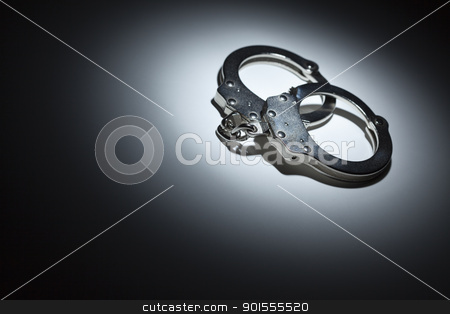 To use this stock image in your creative project, please select the size you need over to the right and click the "Add to Cart" button.
Your downloaded image will come with the Cutcaster watermark removed so don’t worry about the watermark you see on this page. Abstract Pair of Handcuffs Under Spot Light - Text Room stock photo, Abstract Pair of Handcuffs Under Spot Light With Room For Your Own Text. by Andy Dean