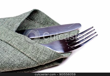 To use this stock image in your creative project, please select the size you need over to the right and click the "Add to Cart" button.
Your downloaded image will come with the Cutcaster watermark removed so don’t worry about the watermark you see on this page. Knife and fork on green napkin close up stock photo, Knife and fork on green napkin by Nanisimova