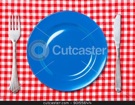 To use this stock image in your creative project, please select the size you need over to the right and click the "Add to Cart" button.
Your downloaded image will come with the Cutcaster watermark removed so don’t worry about the watermark you see on this page. Blue dinner plate with fork and knife stock photo, Empty blue dinner plate with fork and knife on red and white checked tablecloth. by Pablo Caridad