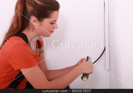 To use this stock image in your creative project, please select the size you need over to the right and click the "Add to Cart" button.
Your downloaded image will come with the Cutcaster watermark removed so don’t worry about the watermark you see on this page. portrait of a female electrician stock photo, portrait of a female electrician by photography33