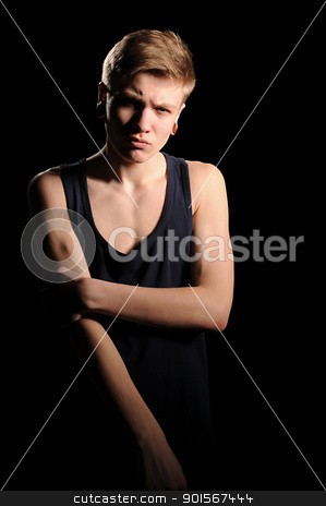 To use this stock image in your creative project, please select the size you need over to the right and click the "Add to Cart" button.
Your downloaded image will come with the Cutcaster watermark removed so don’t worry about the watermark you see on this page. teenager stock photo, portrait of a teenager on darken background by Salauyou Yury
