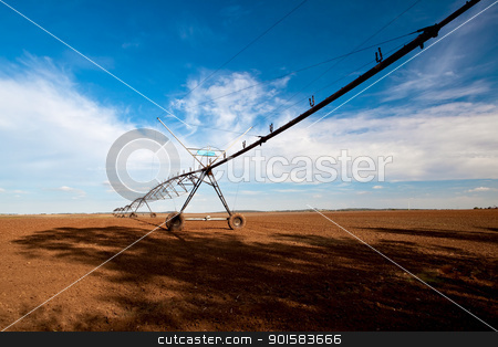 To use this stock image in your creative project, please select the size you need over to the right and click the "Add to Cart" button.
Your downloaded image will come with the Cutcaster watermark removed so don’t worry about the watermark you see on this page. Agriculture farm stock photo, Agriculture farm being irrigated by industrials mechanisms by ikostudio