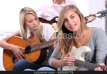 To use this stock image in your creative project, please select the size you need over to the right and click the "Add to Cart" button.
Your downloaded image will come with the Cutcaster watermark removed so don’t worry about the watermark you see on this page. Teenagers playing the guitar stock photo, Teenagers playing the guitar by photography33