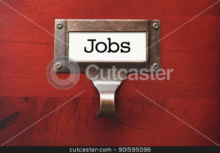 To use this stock image in your creative project, please select the size you need over to the right and click the "Add to Cart" button.
Your downloaded image will come with the Cutcaster watermark removed so don’t worry about the watermark you see on this page. Lustrous Wooden Cabinet with Jobs File Label stock photo, Lustrous Wooden Cabinet with Jobs File Label in Dramatic LIght. by Andy Dean