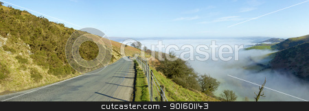 To use this stock image in your creative project, please select the size you need over to the right and click the "Add to Cart" button.
Your downloaded image will come with the Cutcaster watermark removed so don’t worry about the watermark you see on this page. Panorama narrow road Welsh hills morning mist. stock photo, Panorama narrow road Welsh hills morning mist, Mynydd Epynt. by Stephen Rees