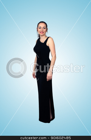 To use this stock image in your creative project, please select the size you need over to the right and click the "Add to Cart" button.
Your downloaded image will come with the Cutcaster watermark removed so don’t worry about the watermark you see on this page. Beautiful Brunette Wearing a Long Black Dress (2) stock photo, A lovely brunette wearing a long black dress, isolated on a gradient teal background. Generous copyspace. by Carl Stewart