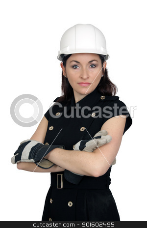 To use this stock image in your creative project, please select the size you need over to the right and click the "Add to Cart" button.
Your downloaded image will come with the Cutcaster watermark removed so don’t worry about the watermark you see on this page. Beautiful Female Construction Worker (3) stock photo, A lovely brunette wearing a white hardhat, work gloves, and a snappy dress, with her arms crossed. Isolated on a white background. by Carl Stewart