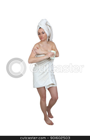 To use this stock image in your creative project, please select the size you need over to the right and click the "Add to Cart" button.
Your downloaded image will come with the Cutcaster watermark removed so don’t worry about the watermark you see on this page. Beautiful Bath-n-Body Woman (2) stock photo, A lovely woman wearing bath towels, holding a bottle of lotion. Isolated on a white background with generous copyspace. by Carl Stewart