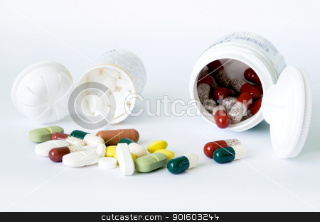 To use this stock image in your creative project, please select the size you need over to the right and click the "Add to Cart" button.
Your downloaded image will come with the Cutcaster watermark removed so don’t worry about the watermark you see on this page. Tablets and capsules with two bottles stock photo, Different forms and colours tablets and capsules and two white bottles by Iryna Rasko