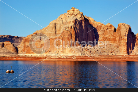 To use this stock image in your creative project, please select the size you need over to the right and click the "Add to Cart" button.
Your downloaded image will come with the Cutcaster watermark removed so don’t worry about the watermark you see on this page. Castle Rock Wahweap Bay Lake Powell Glen Canyon Recreation Area stock photo, Castle Rock Reflection Wahweap Bay Lake Powell Glen Canyon Recreation Area Arizona by William Perry