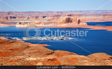 To use this stock image in your creative project, please select the size you need over to the right and click the "Add to Cart" button.
Your downloaded image will come with the Cutcaster watermark removed so don’t worry about the watermark you see on this page. Wahweap Marina Wahweap Bay Lake Powell Glen Canyon Recreation Ar stock photo, Wahweap Bay Wahweap Marina Castle Rock Lake Powell Glen Canyon Recreation Area Arizona by William Perry