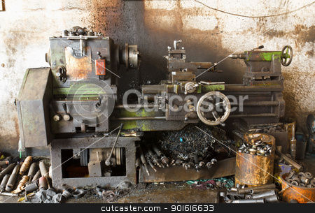 To use this stock image in your creative project, please select the size you need over to the right and click the "Add to Cart" button.
Your downloaded image will come with the Cutcaster watermark removed so don’t worry about the watermark you see on this page. Old lathe stock photo, Old lathe by stoonn