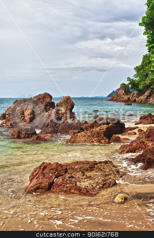 To use this stock image in your creative project, please select the size you need over to the right and click the "Add to Cart" button.
Your downloaded image will come with the Cutcaster watermark removed so don’t worry about the watermark you see on this page. Rocky Shore stock photo, rocky along the beach, Andaman Sea, Thailand by Petr Malyshev