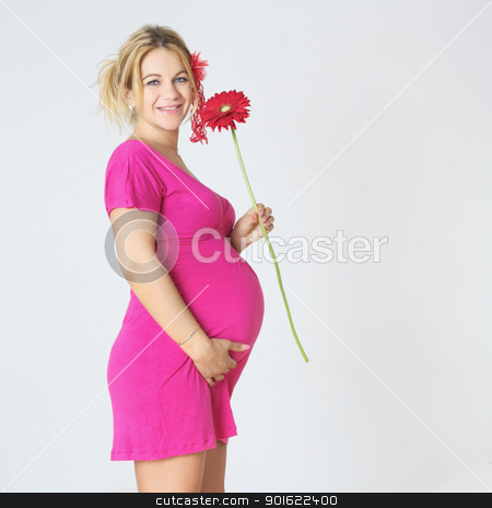 To use this stock image in your creative project, please select the size you need over to the right and click the "Add to Cart" button.
Your downloaded image will come with the Cutcaster watermark removed so don’t worry about the watermark you see on this page. Pregnant Woman with Flower stock photo, pregnant woman standing in room with gerbera by Petr Malyshev