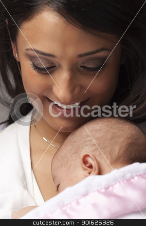 To use this stock image in your creative project, please select the size you need over to the right and click the "Add to Cart" button.
Your downloaded image will come with the Cutcaster watermark removed so don’t worry about the watermark you see on this page. Attractive Ethnic Woman with Her Newborn Baby stock photo, Young Attractive Ethnic Woman Holding Her Newborn Baby Under Dramatic Lighting. by Andy Dean